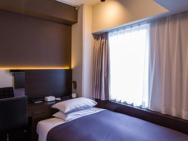 Ochanomizu Inn : photo 3 de la chambre chambre double avec petit lit double - non-fumeurs