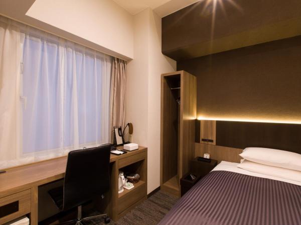 Ochanomizu Inn : photo 2 de la chambre chambre double avec petit lit double - non-fumeurs