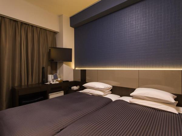 Ochanomizu Inn : photo 1 de la chambre chambre lits jumeaux - non-fumeurs