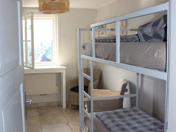 Stadtalm Naturfreundehaus : photo 1 de la chambre chambre lits jumeaux standard avec lits superposés