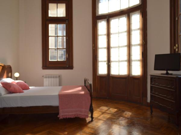 Che Argentina Hostel Suites : photo 5 de la chambre chambre quadruple avec salle de bains privative