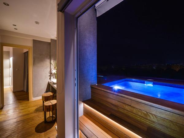 A.P. Acropolis View Apartments : photo 4 de la chambre suite avec bain à remous - vue panoramique sur acropole et lycabette
