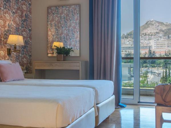 Delice Hotel - Family Apartments : photo 3 de la chambre appartement 2 chambres (5 adultes) - vue sur colline du lycabette