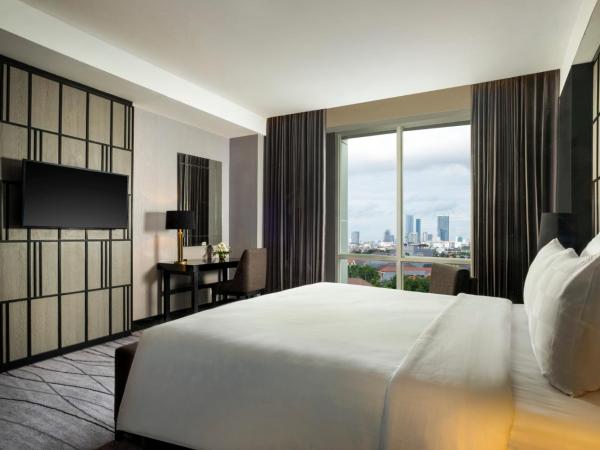 Grand Swiss-Belhotel Darmo : photo 2 de la chambre chambre lit king-size deluxe