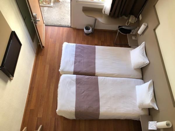 Hotel Cristol : photo 2 de la chambre chambre lits jumeaux avec lit d’appoint - 301
