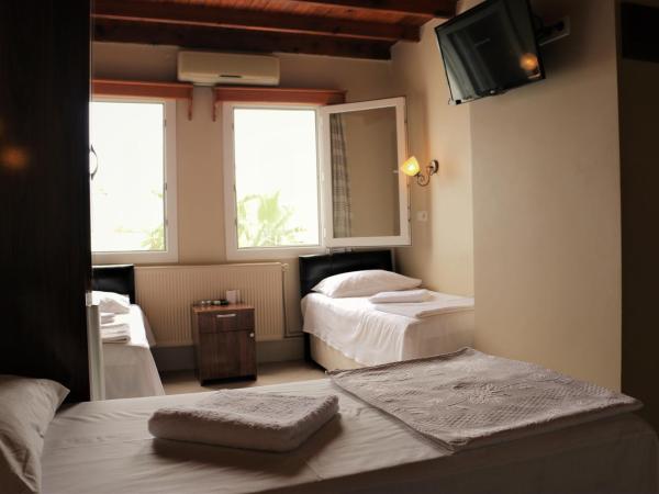 Durak Hotel : photo 7 de la chambre chambre quadruple