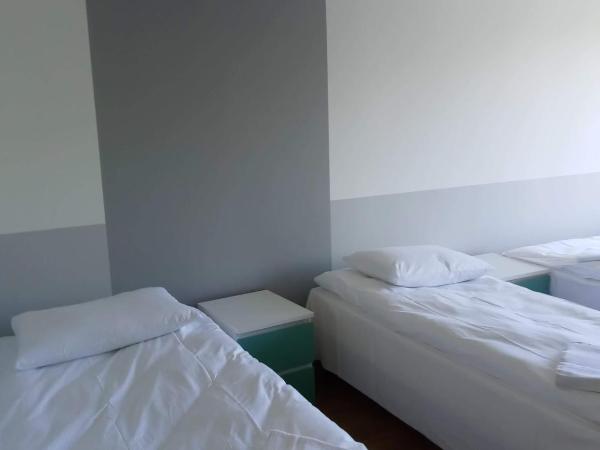 Ośrodek Pomeranka : photo 2 de la chambre chambre lits jumeaux pour personnes à mobilité réduite