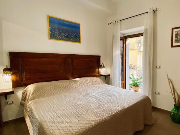 Casa FERRARA : photo 10 de la chambre chambre quadruple avec balcon 