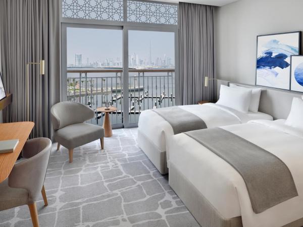 Vida Creek Harbour : photo 2 de la chambre partial marina view deluxe room twin - free shuttle to dubai mall & la mer beach