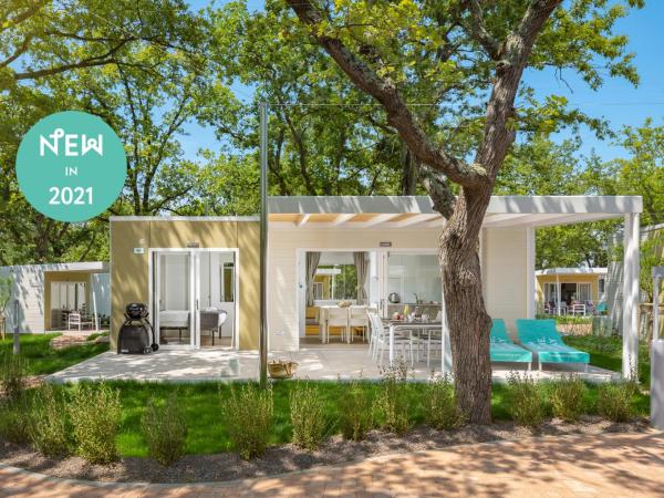 Camping Ulika Mobile Homes - Naturist : photo 1 de la chambre premium family mobile home with pool view (4+1)