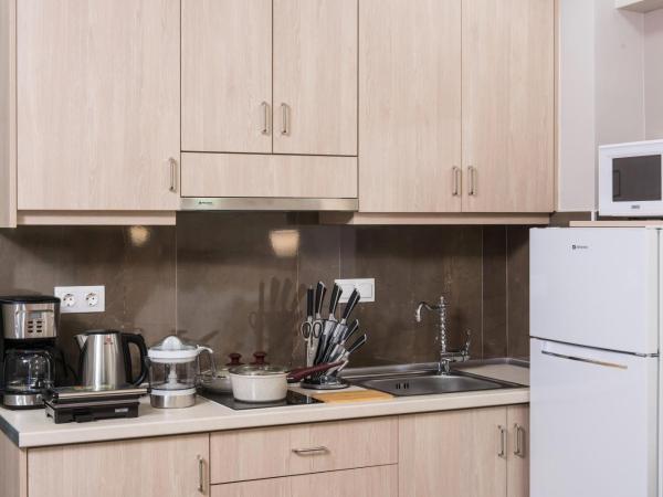 Dorian Boutique Hotel-Apartments : photo 10 de la chambre studio supérieur avec terrasse - vue panoramique sur mer