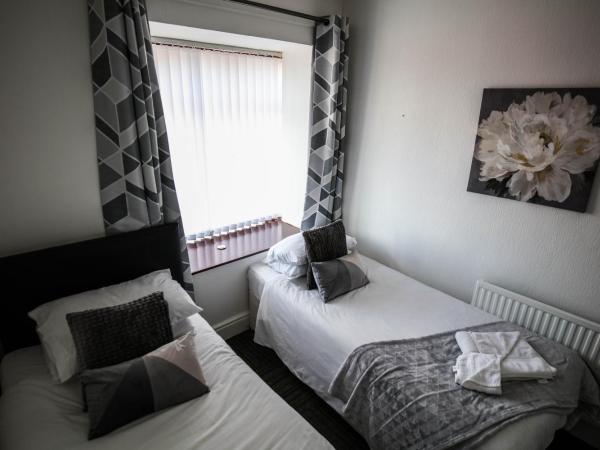 St Hilda Guesthouse : photo 1 de la chambre chambre lits jumeaux avec salle de bains commune