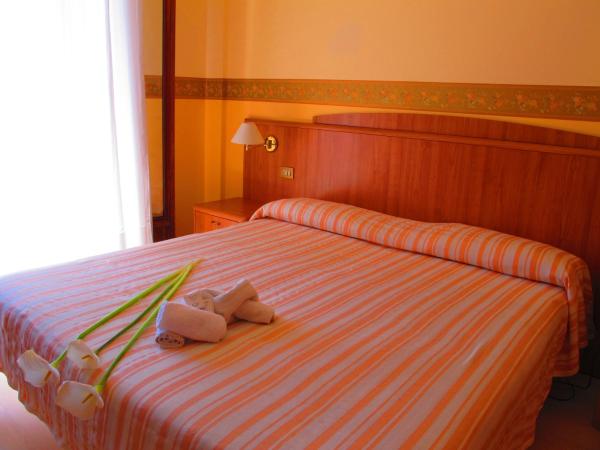 Hotel Smeraldo : photo 2 de la chambre chambre familiale (2 adultes et 2 enfants)
