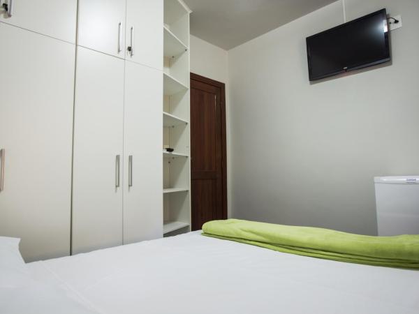 Pousada 45 Hostel : photo 3 de la chambre chambre quadruple avec baignoire