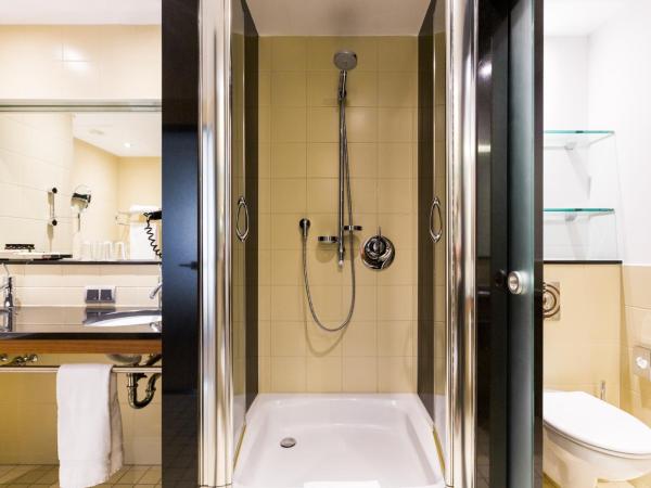 Pullman Eindhoven Cocagne : photo 4 de la chambre suite supérieure lit king-size