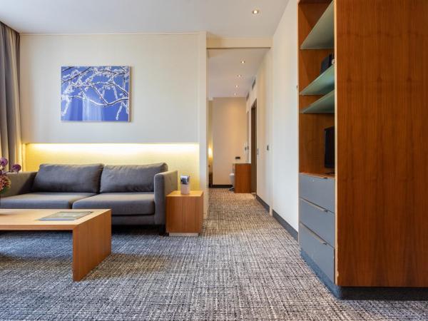 Pullman Eindhoven Cocagne : photo 1 de la chambre suite supérieure lit king-size
