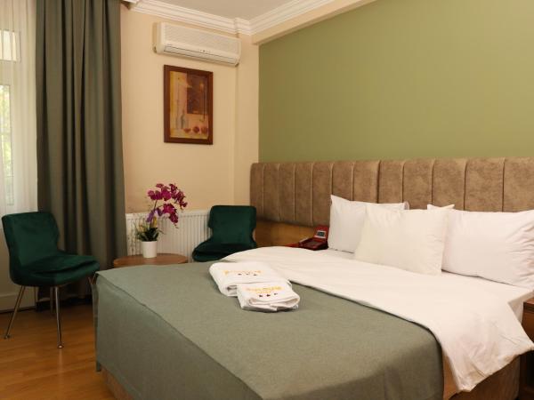 Buldum Otel : photo 4 de la chambre grande chambre simple