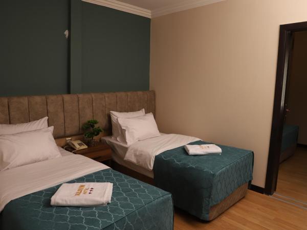 Buldum Otel : photo 7 de la chambre suite familiale avec balcon