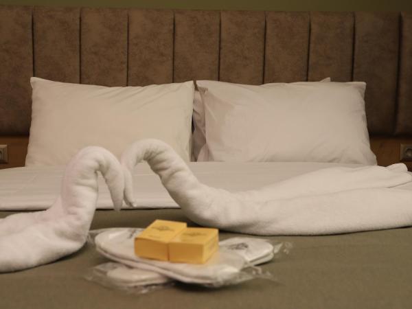 Buldum Otel : photo 8 de la chambre suite familiale avec balcon