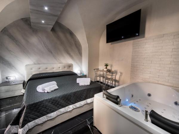 Suite Vico li cuti : photo 2 de la chambre suite deluxe avec baignoire spa