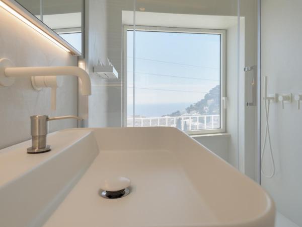 Sopramonte Exclusive Rooms : photo 8 de la chambre chambre double deluxe - vue sur mer