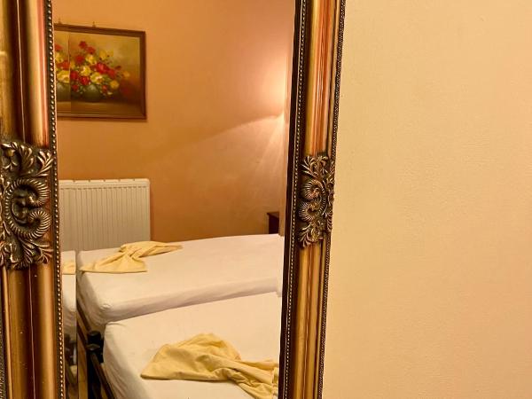Minos Pension : photo 4 de la chambre chambre lits jumeaux Économique