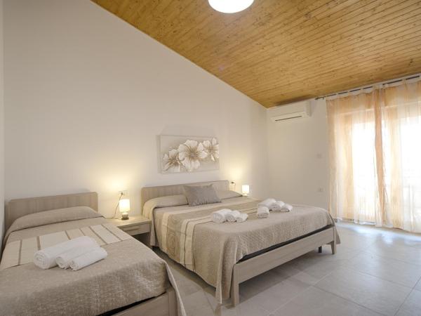 Casa Lucia : photo 2 de la chambre chambre familiale avec salle de bains privative