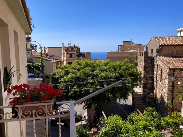 Casa FERRARA : photo 2 de la chambre chambre quadruple avec balcon 