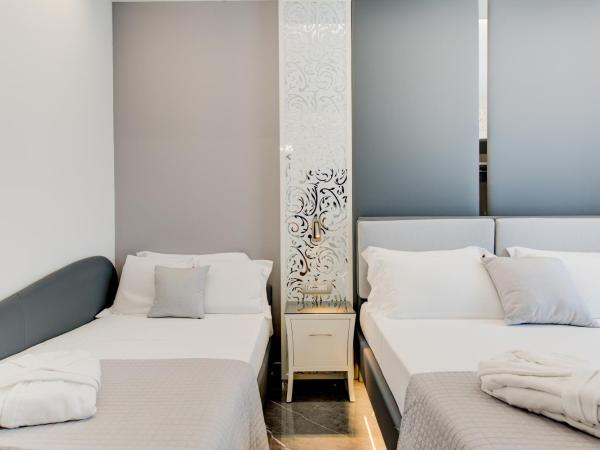 Hotel Due Mari & SPA : photo 1 de la chambre chambre triple supérieure