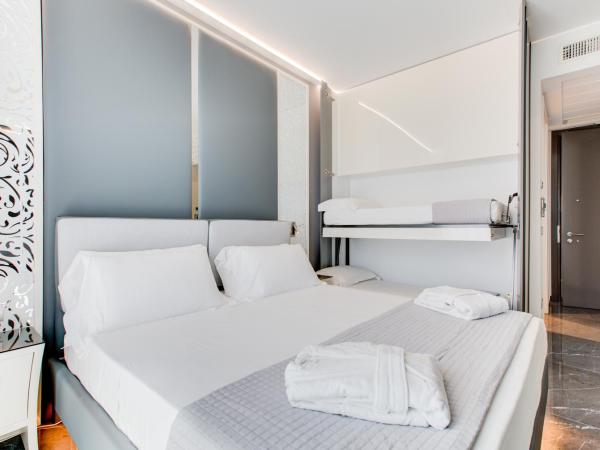 Hotel Due Mari & SPA : photo 1 de la chambre chambre quadruple supérieure