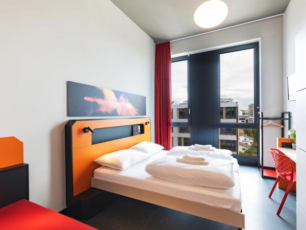 MEININGER Hotel Genève Centre Charmilles : photo 1 de la chambre chambre triple