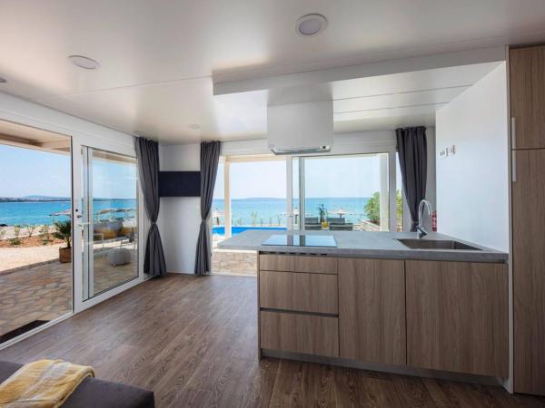 Terra Park Phalaris : photo 3 de la chambre mobile home marinus avec piscine