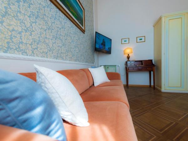 Villa Scacciapensieri Boutique Hotel : photo 10 de la chambre chambre double deluxe avec lit d'appoint