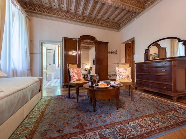 Villa Scacciapensieri Boutique Hotel : photo 3 de la chambre chambre double deluxe avec lit d'appoint