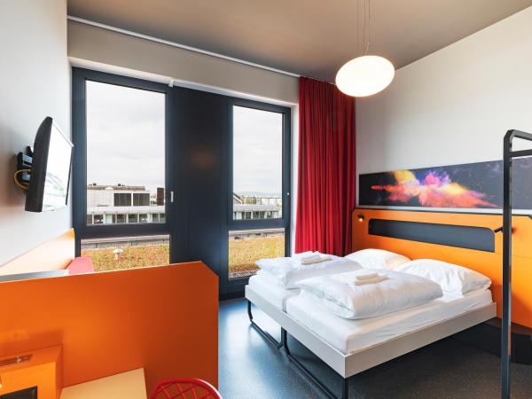 MEININGER Hotel Genève Centre Charmilles : photo 2 de la chambre chambre lits jumeaux