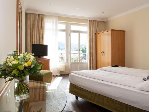 Hotel Seeburg : photo 1 de la chambre chambre lits jumeaux supérieure avec balcon - vue sur lac