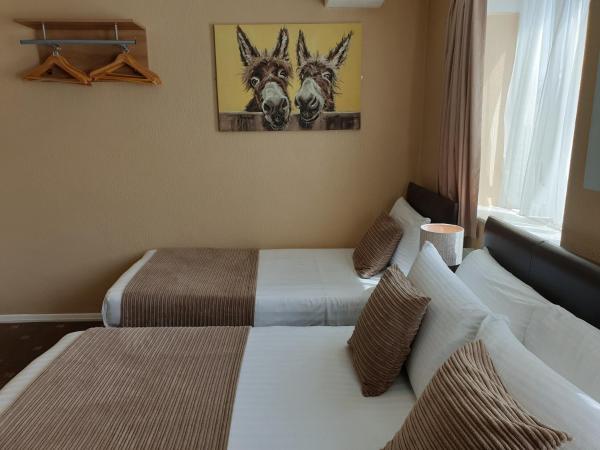 Corona Blackpool : photo 7 de la chambre chambre familiale (2adultes + 1enfant)