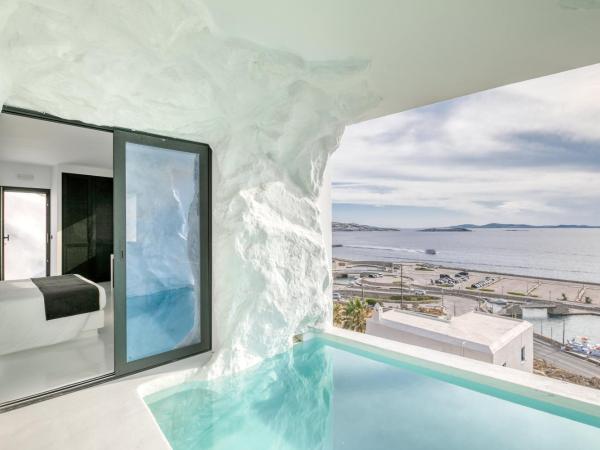 Tagoo Black Mykonos : photo 3 de la chambre chambre double deluxe avec piscine troglodyte privée