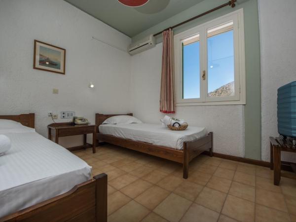 Mitos Village : photo 1 de la chambre chambre quadruple standard