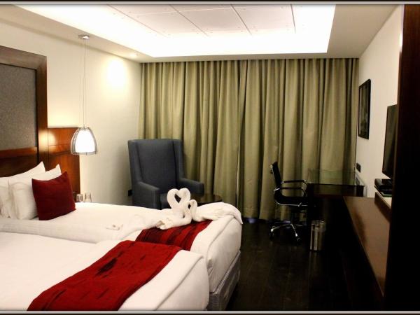 Citrus Hotel Cunningham : photo 6 de la chambre chambre deluxe double ou lits jumeaux