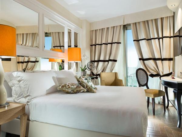 Erbavoglio Hotel : photo 1 de la chambre chambre double ou lits jumeaux supérieure avec balcon