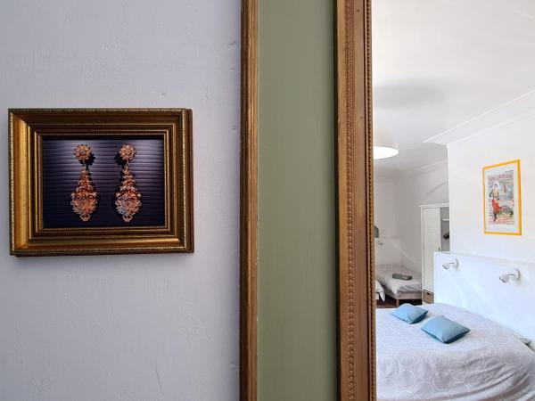 Au Soleil Boulonnais : photo 5 de la chambre chambre quadruple avec salle de bains privative séparée