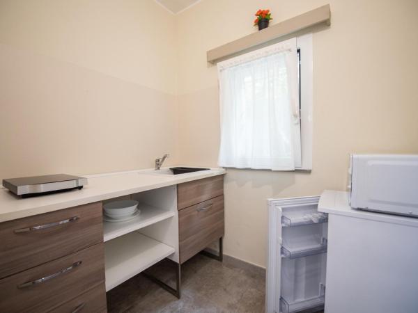 Le PALME : photo 5 de la chambre studio deluxe