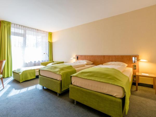 Schlosspark Hotel : photo 4 de la chambre chambre double ou lits jumeaux avec canapé-lit