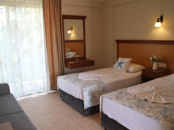 Rosy Suites Hotel : photo 10 de la chambre studio avec vue sur jardin