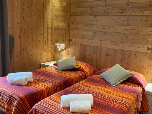Sottosopra Alps Apartments & Rooms : photo 3 de la chambre chambre double ou lits jumeaux
