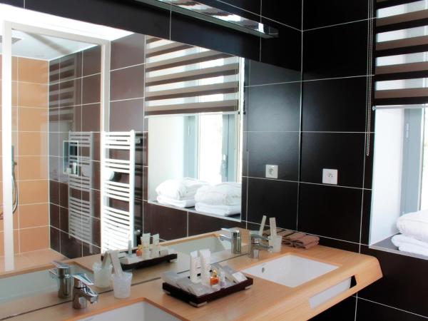 Mas de Boudan : photo 4 de la chambre suite - vue sur jardin