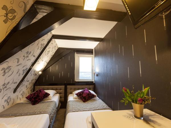 Hotel Hermitage Amsterdam : photo 5 de la chambre petite chambre lits jumeaux