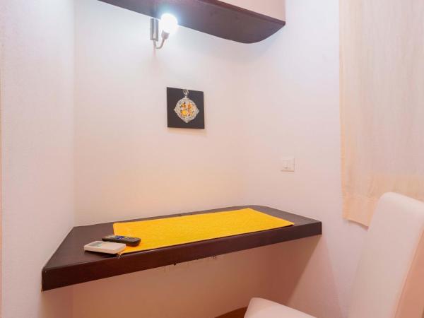 Le Suite Sul Corso : photo 9 de la chambre chambre triple