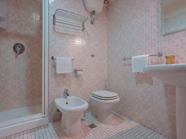 Le Suite Sul Corso : photo 9 de la chambre chambre quadruple avec salle de bains
